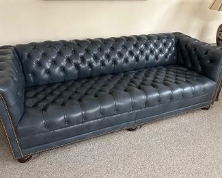 Blue leather (“Glazed Blue Antique”) chesterfield sofa by Hancock and Moore