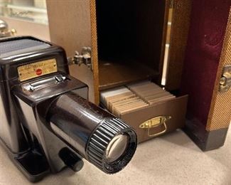 Vintage projector with case and landscape slides