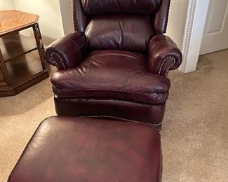 Leather arm chair with ottoman by Hancock & Moore
