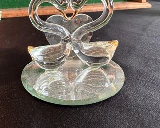 Glass swans in heart shape