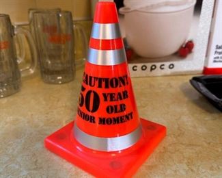 Plastic caution 50=year old senior moment cone