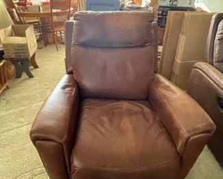 Leather recliner - has wear and tear marks all over. Still reclines. Asking $25