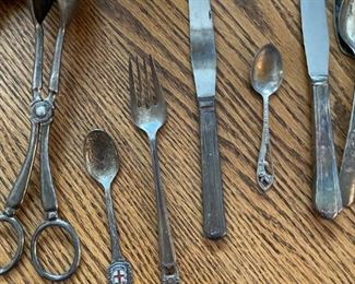 Silver cutlery set. $50