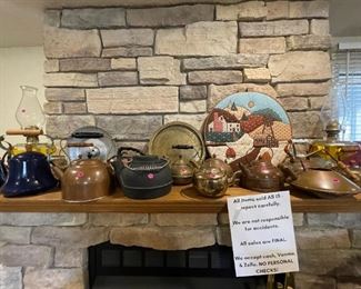 Various brass, copper, and cast iron tea kettles. $15 for the larger ones, $10 for smaller ones.