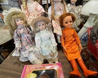 Antique collectible dolls. The two with the wooden rocking chair are $15 each, other ones range from $5-$10 depending on size.
