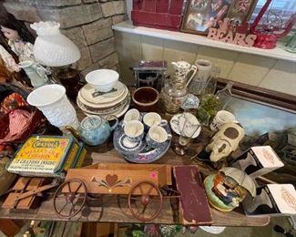Variety of antique dishes, vases, toys, etc.