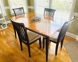 dining table with 4 slat back chairs