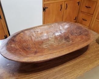 a wooden dough bowl