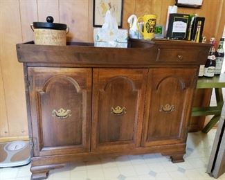 A dry sink with copper lining