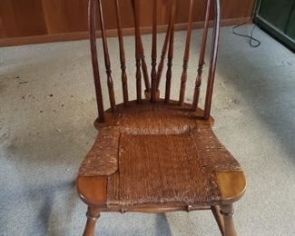 There are 5 chairs- two with arms and 3 without