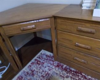 Corner desk with matching pieces on either side