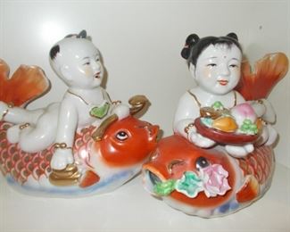 Lucky children riding fish