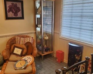 Store display cabinet and a wicker chair and footstool 