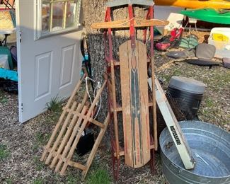 Awesome old wooden sleds…
“snow season is over” you say, but
“Lies!” I cries. 
Tis’ Texas you see;
could be a blizzard in July!