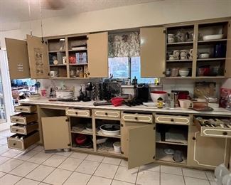 Kitchen is large and open, but the cabinets were packed..