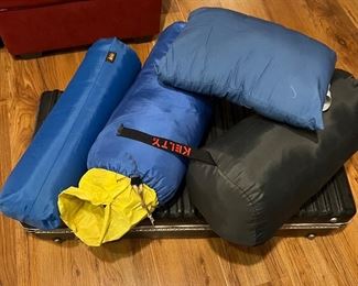 We got sleeping bags and sleeping accessories by REI, Kelty and Slumberjack! Sleep in warm style… even if your in the woods.