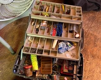 Box of fishing supplies and some old lures