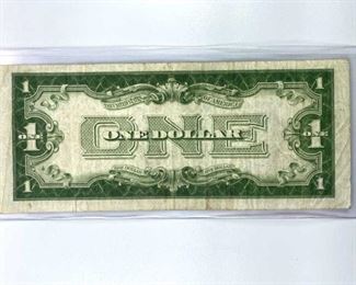 1928A $1 'Funny Back' Blue Seal Silver