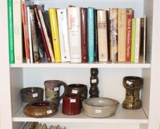 Cook books and pottery.