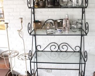 Two white iron lamps and Black iron bakers rack with glass shelves.