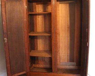 Antique knockdown wardrobe shown with doors open. Great storage piece.