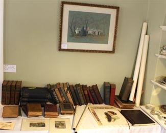 Large quantity of old books and vintage maps of Key West and Jupiter, Florida.