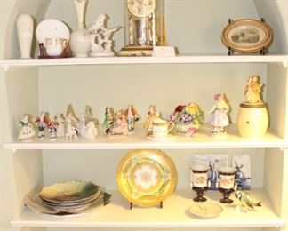 Anniversary clock, porcelain figurines, Old Cathedral Spode plate and more.