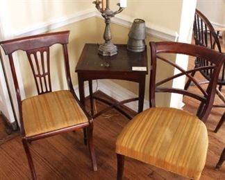 Dining chairs, small table and candelabra lamp.