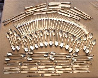 Rosepoint by Wallace sterling flatware.