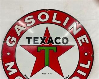 CLOSEUP TOP TEXACO SIGN