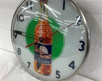 SUNCREAST CLOCK W/ BOTTLE