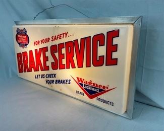 RIGHTSIDE LIGHTED BRAKE SERVICE SIGN