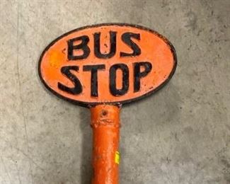 CLOSEUP EMB. CAST BUS STOP SIGN