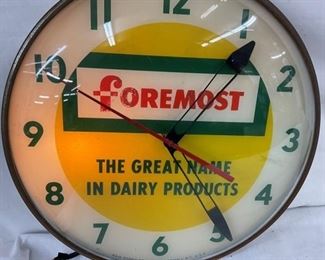 CLOSEUP FOREMOST DAIRY CLOCK