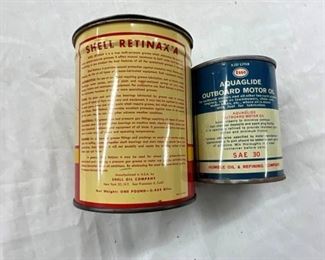 BACKSIDE ESSO AND SHELL CANS