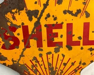 CLOSE UP SIDE 2 PORC. SHELL SIGN