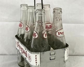 SIDE VIEW W/ RED/WHITE PEPSI BOTTLES