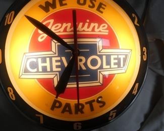 CLOSE UP CONTEMPORARY CHEVROLET CLOCK