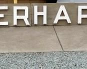 CORNER HARDWARE SIGN