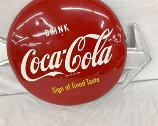 CLOSEUP COKE ARROW SIGN