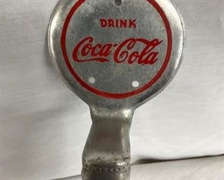 CLOSEUP COKE BOTTLE DOOR PULL