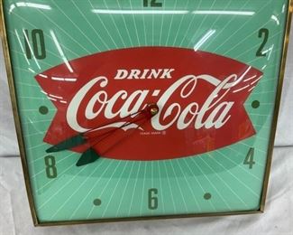 CLOSEUP FISHTAIL CLOCK