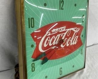 SIDE VIEW COKE CLOCK