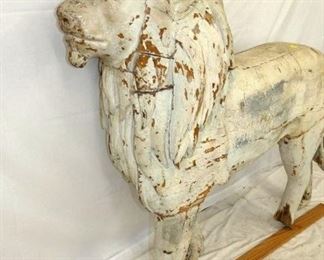 CLOSEUP FRONT VIEW WOODEN LION