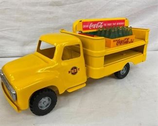 CLOSEUP OTHERSIDE COKE TOY