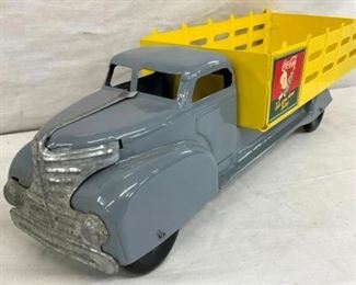 CLOSEUP OTHERSIDE COKE TOY