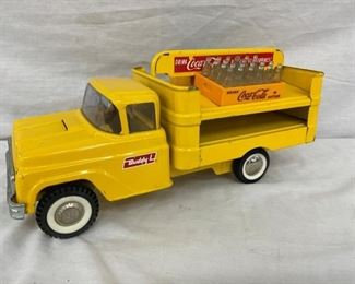 CLOSEUP OTHERSIDE COKE TOY