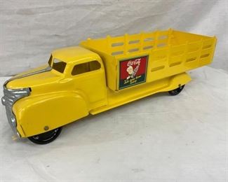 CLOSEUP OTHERSIDE COKE TOY