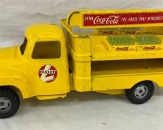 CLOSEUP OTHERSIDE COKE TOY