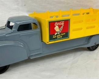 CLOSEUP OTHERSIDE COKE TOY